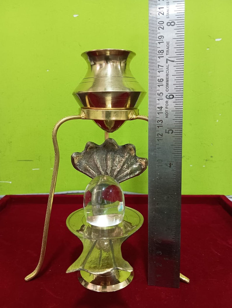 Brass Abhishek Kalasam with Crystal Shiva Ling Lingam and Pure Puja Brass Stand - Height Approx: 7 Inch in India, UK, USA, All Country
